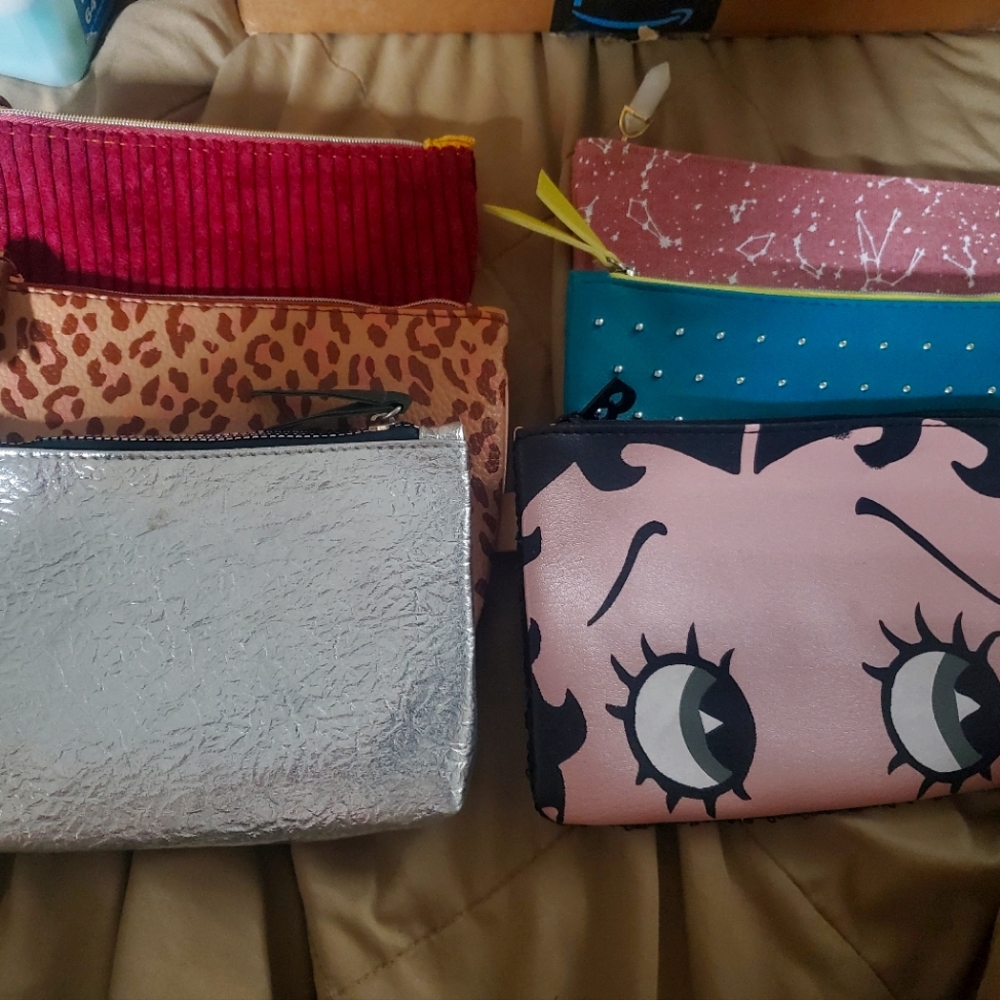 Assortment of Ipsy makeup bags